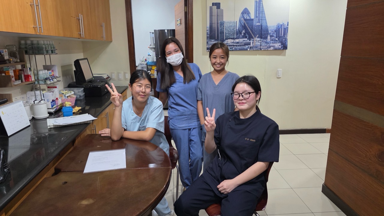 Minji and local clinical staff during the Cebu field activity, shown with a light privacy blur